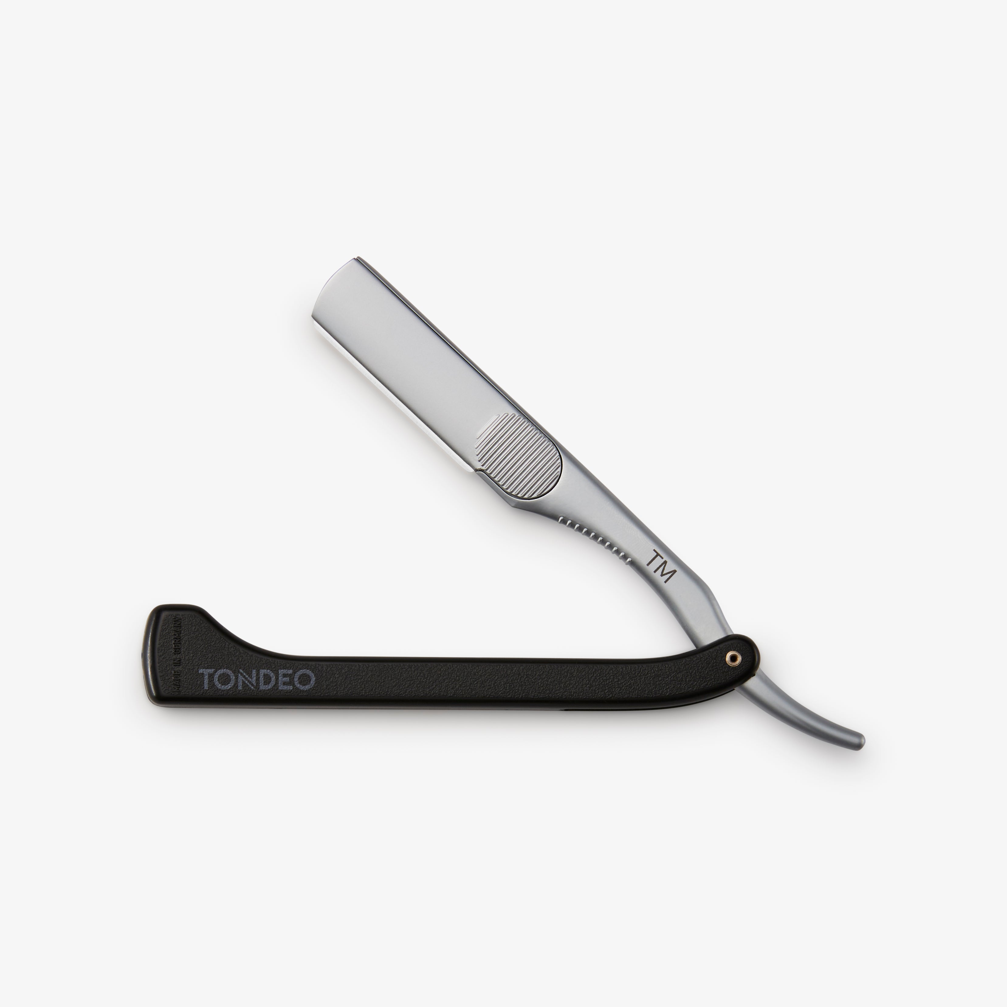 Hochwertiges TONDEO Rasiermesser für Barbiere und Friseure – präzises Schneidwerkzeug mit Wechselklinge, deutsche Qualität aus Solingen mit ergonomischem Griff und scharfer Klinge