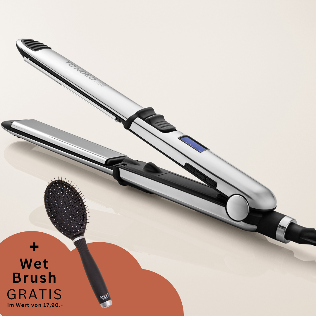 Glänzendes Glätteisen mit Gratisbürste