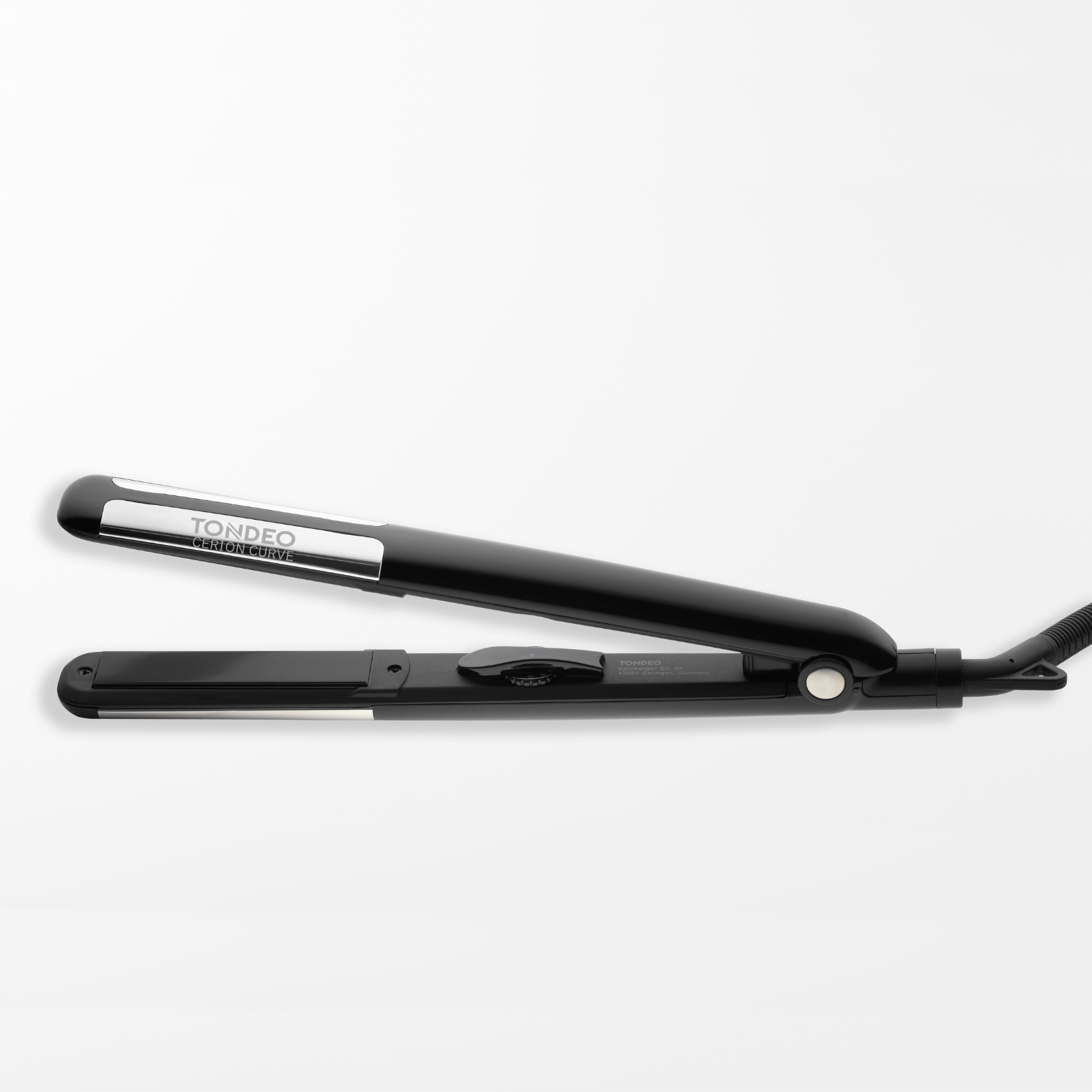 Schwarzes Glätteisen von TONDEO Solingen, silberne Kuven, federnd gelagerte Heizelemente, Auto-Off-Funktion, 120 °C bis 230 °C individuell einstellen, schnelle Aufheizzeit, Keramik-Tumalin-Heizplatten (23 x 90 mm) für optimale Wärmeverteilung