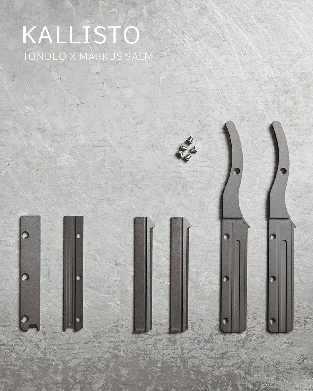 Friseurscheren Einzelteile auf Metallfläche