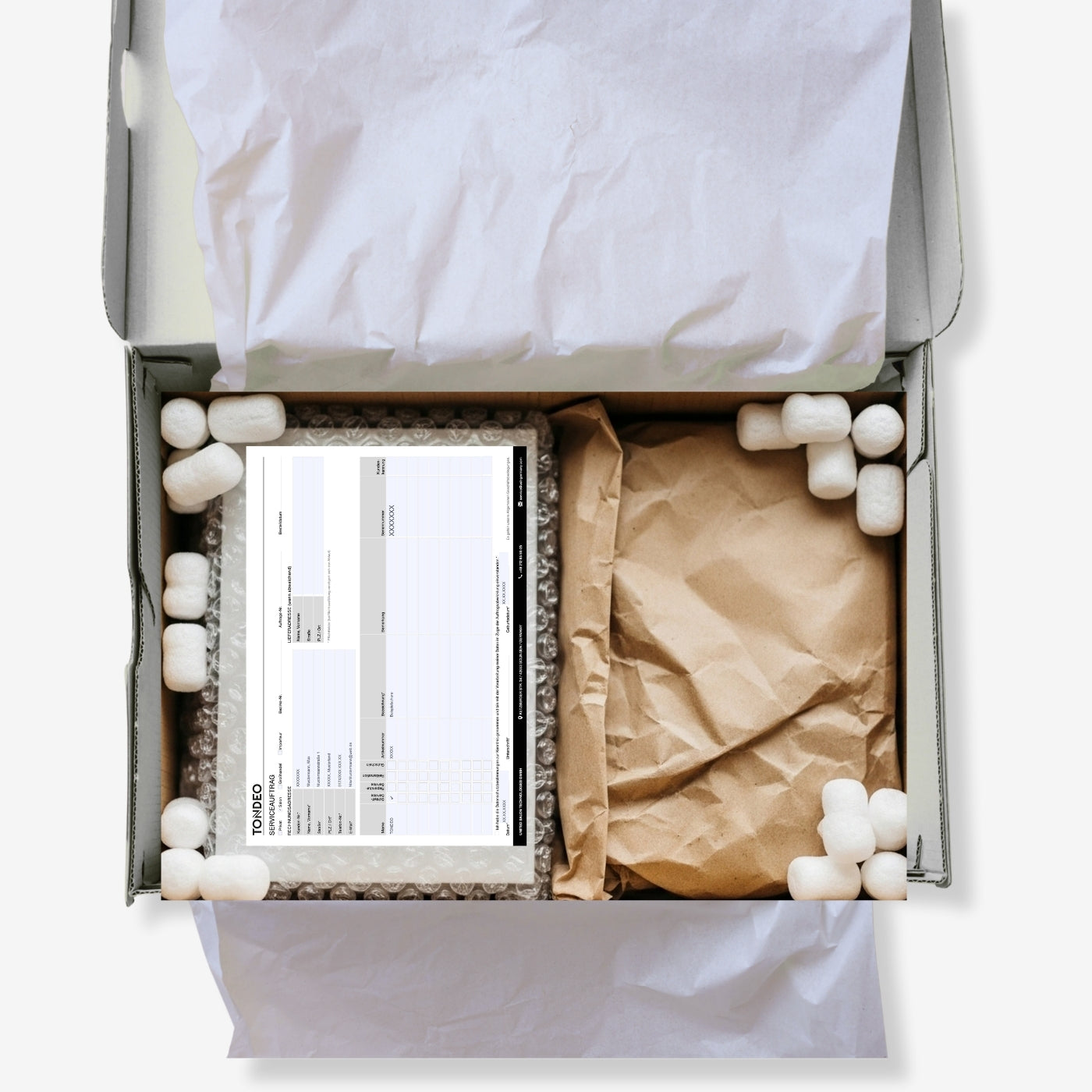 Offene Verpackung mit Friseurschere